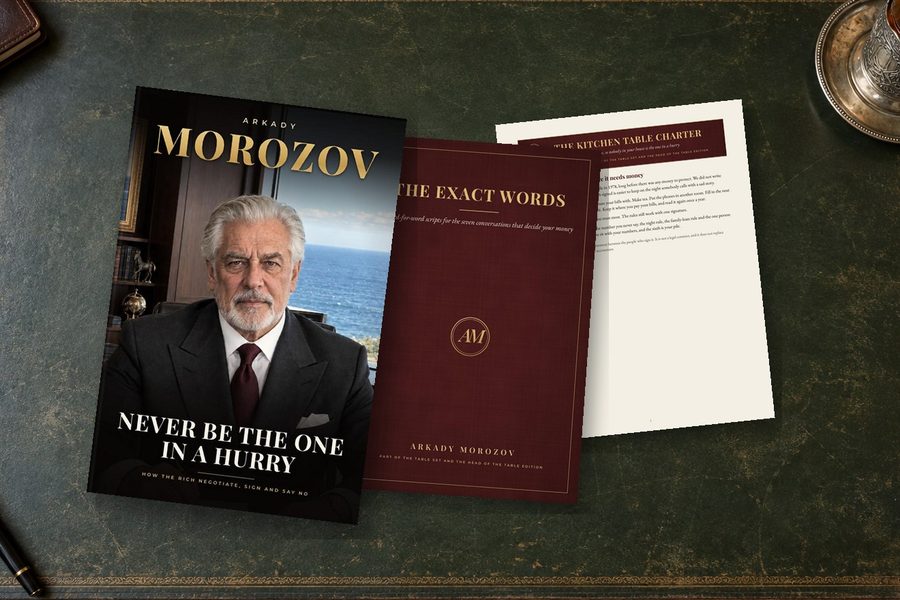 The book, The Exact Words and The Kitchen Table Charter, printed as an example, on Arkady's desk
